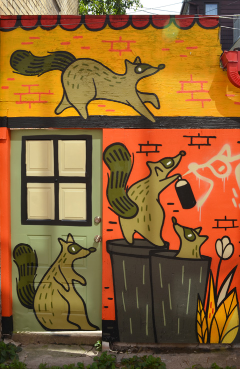 raccoon mural by Mily May Rose, raccoon on top of garbage cans, climbing on roofs, spray painting, inside garbage bins