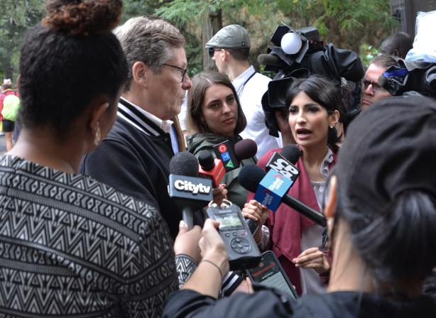 Toronto mayor John TOry being interviewed by the media at a pro-Pride rally at Barbara Hall Park, City TV, CP 24, CTV and Global News were among the media. 