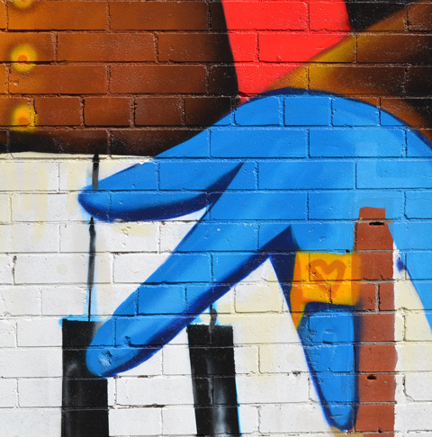 part of a mural, the band of story tellers, a group of musicians all with blue skin, hand of keyboard player with yellow ring with a heart on it 