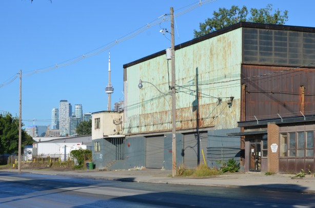 old buildings on Villiers Street, with CN Tower in the background 