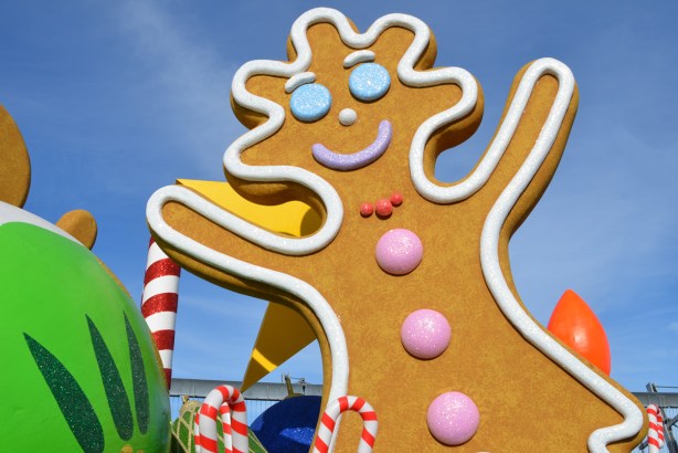 large gingerbread man sculpture on parade float