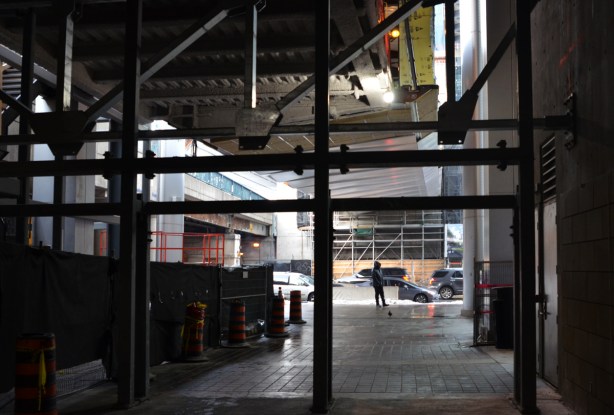 from the inside, looking out, construction of the new exit, and new elevated walkway to building being constructed across the street 