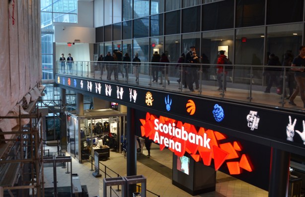 interior, Scotiabank Arena people on elevated walkway between Waterpark Place and Scotiabank Arena 