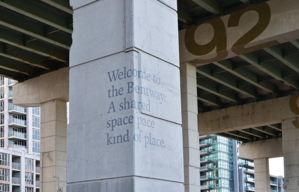 the bentway, the new development and park under the gardiner expressway, words on one of the concrete posts that says Welcome to the Bentway a shared space kind of place