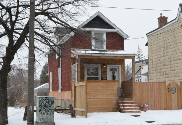 old house number 1432 Dufferin with a new fence
