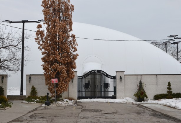 gates and white dome of the TOronto Lawn Tennis Club 