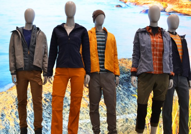 mannequins dressed in outside clothing, long pants, hats, jackets, in orange and blue tones, 