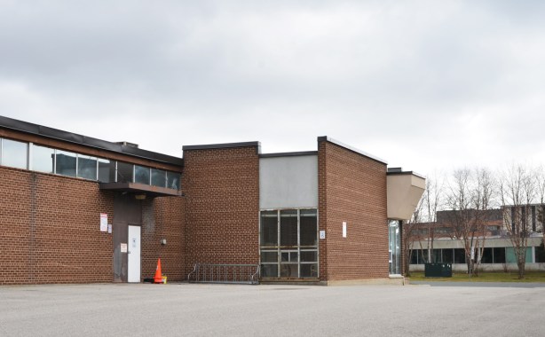 a red brick one storey light industrial building 