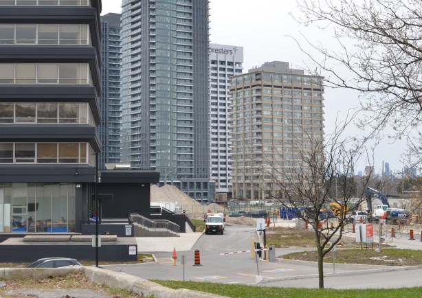 from the northeast corner of Don Mills and Eglinton looking to the south east corner, Foresters building, another older office building and two newer condos. 