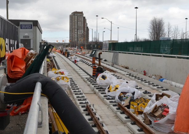 construction of the Crosstown l r t, tracks being laid on the above ground portion of the line, near Eglinton. 