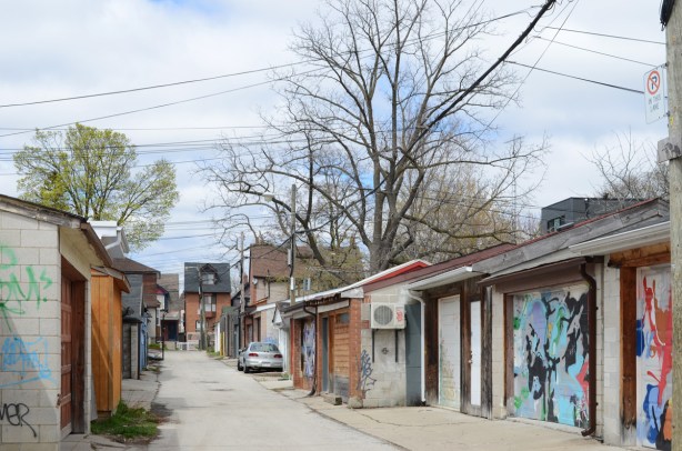 alley, PerlyFamilyLane, with painted garage doors. 