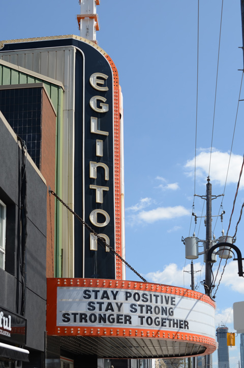 marquee on Eglinton Theatre that says stay positive stay strong stronger together