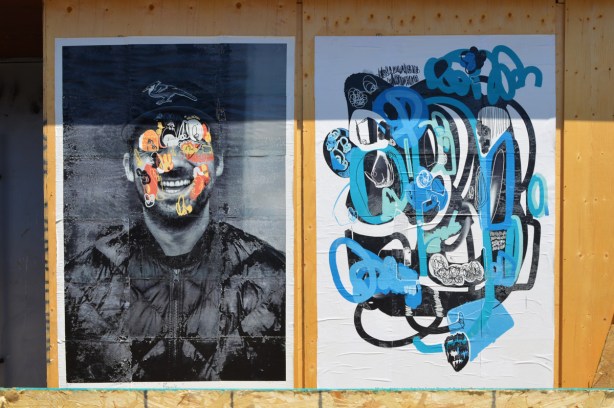 2 large street art posters on wood construction hoardings 