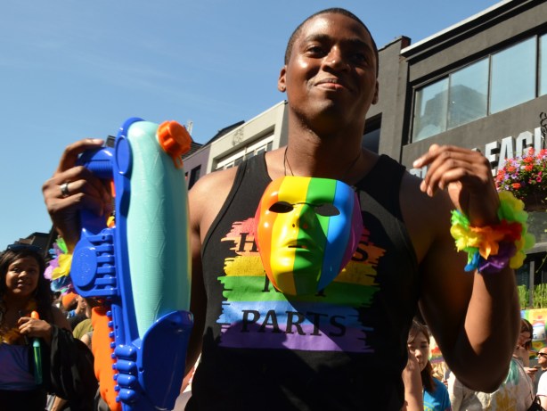 man with rainbow mask