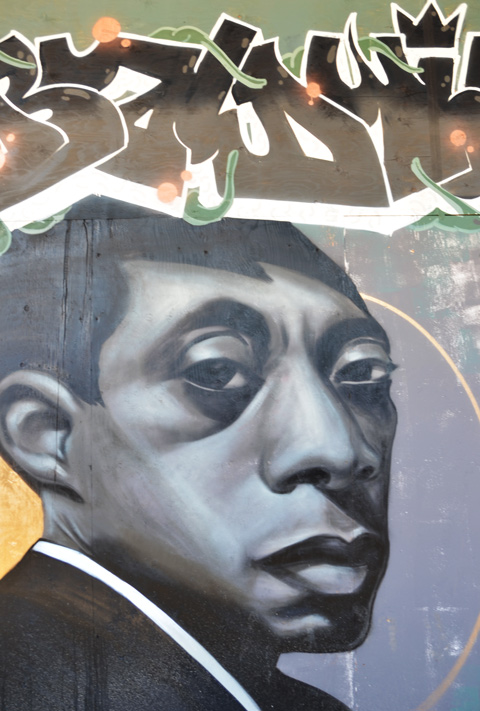 portrait of James Baldwin, mural in Graffiti Alley, by Phillip Saunders 