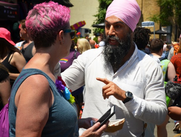 Singh, leader of federal NDP at pride parade, in pink turban 