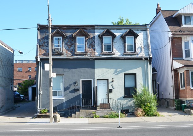 semi divided house from the 1800's, mansard roof of slate, dormer windows