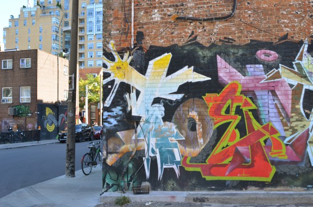 mural in an alley on the north side of Queen West