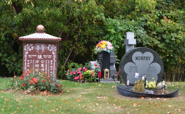monuments, tombstones at Pinehills cemetery including one with a shamrock etched on the front 