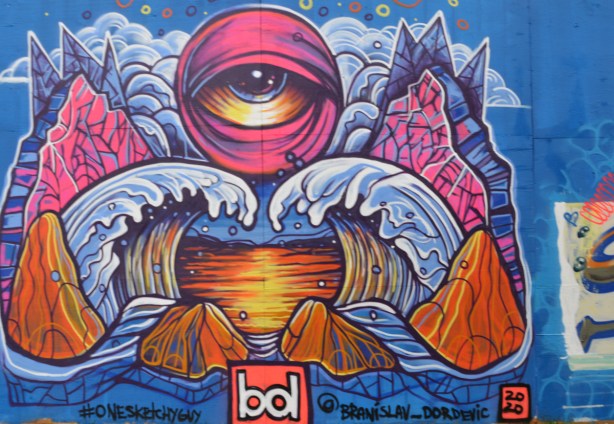 mural, a large eye at top center, ice bergs, lake, ice and snow by onesketchyguy