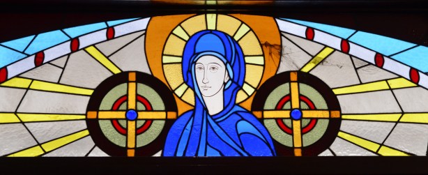 stained glass window over the front entrance of Greek Church 