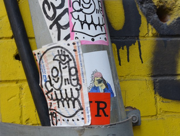 stickers on a pole