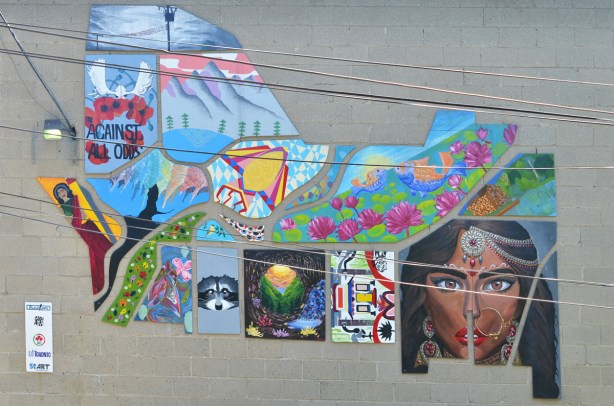 collage of pictures and images on an exterior cement wall