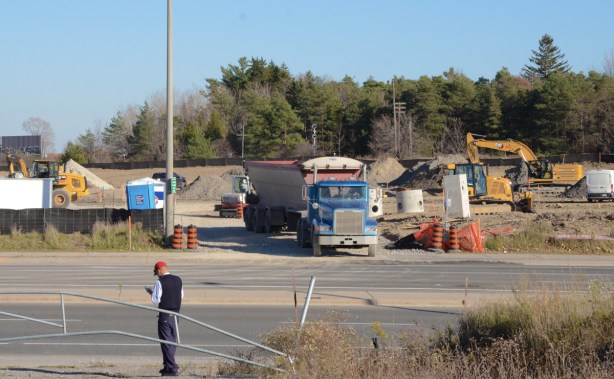 dump truck leaving a construction site