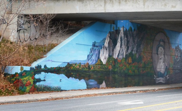 part of mural on side of railway underpass, Scarborough bluffs and Lake Ontario