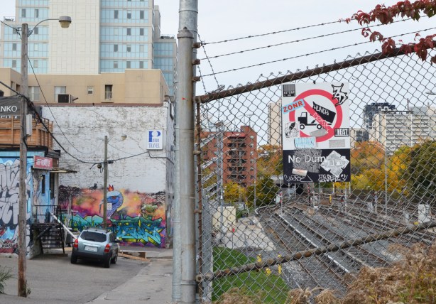 TTC subway tracks running parallel to a lane 