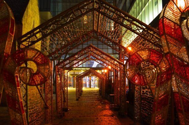 arches and big candy canes, frame for lights outside Eaton Centre, but lights not on. 