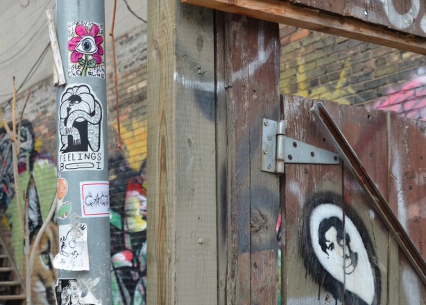 stickers and paste ups in graffit alley 