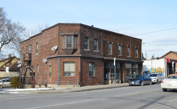 old two story brown brick building on Kingston Road 