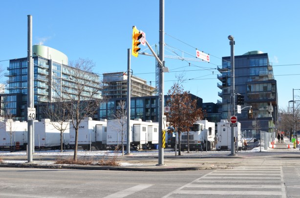 movie film crew trucks on the corner of Cherry and Mill streets