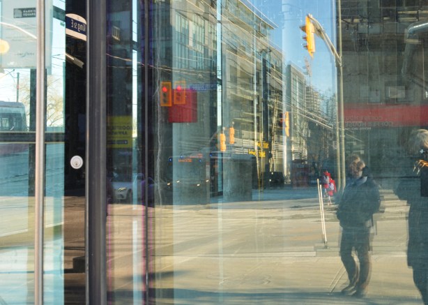 reflections in a window downtown