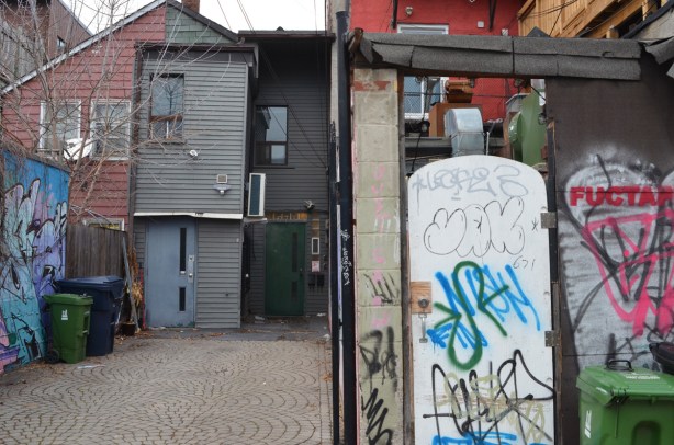 gate, and back of stores on Queen 