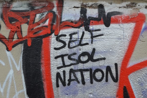 self isol nation spray painted on a wall as part of a graffiti painting