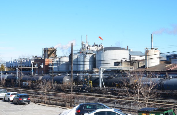 steel tanks, rail line, industrial area