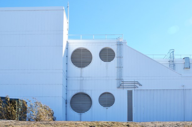 white Bell Canada building in Scarborough with big round vents on the side 