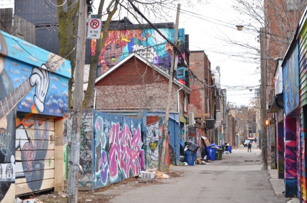 downtown alley with street art 
