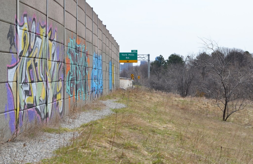 graffiti on a concrete wall beside the Don Valley Parkway just north of York Mills Road 