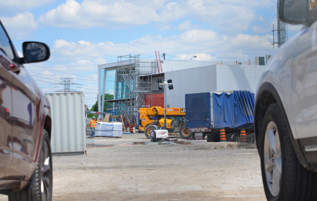 as seen from between two cars, the new Kennedy LRT station under construction