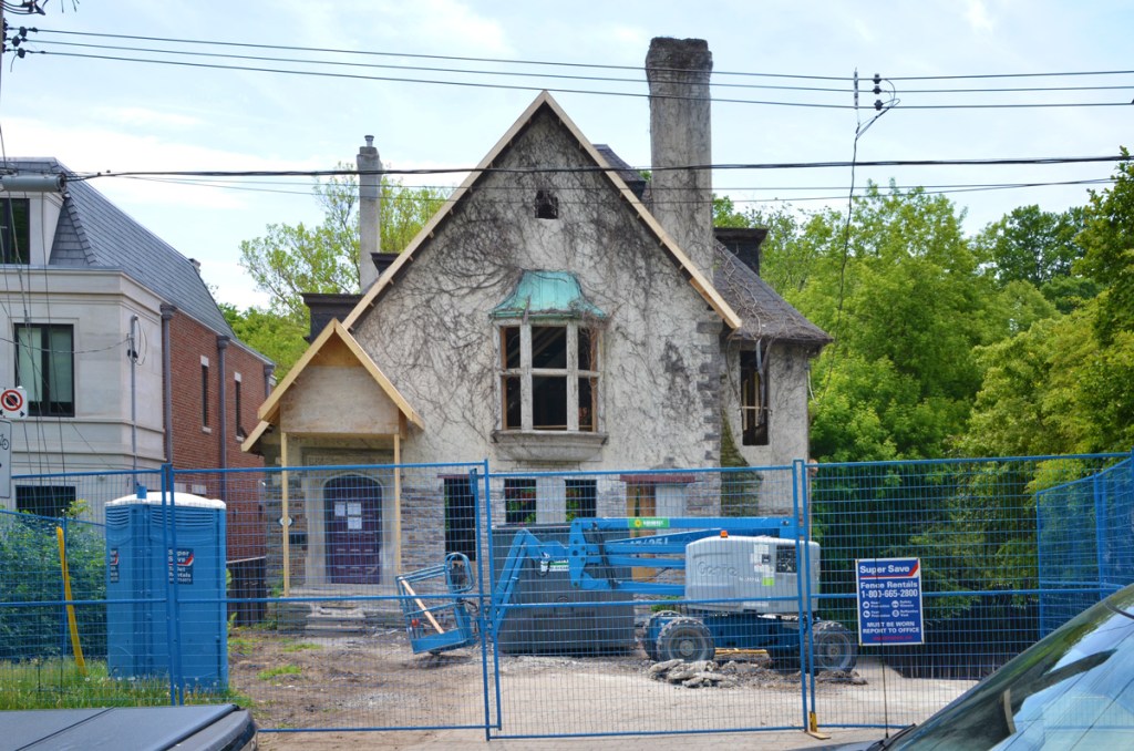 an older house with the insides gutted as part of a renovation
