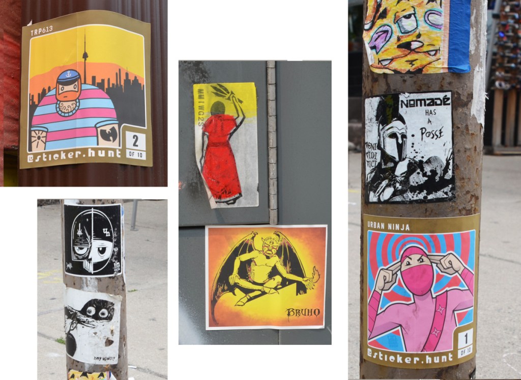 graffiti stickers on poles in Kensington