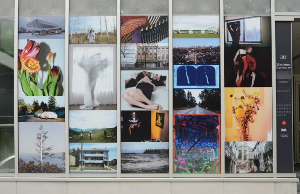 large collage pf photos on wall of Ryerson Image Centre, Maximum Exposure 26, work of graduating students 