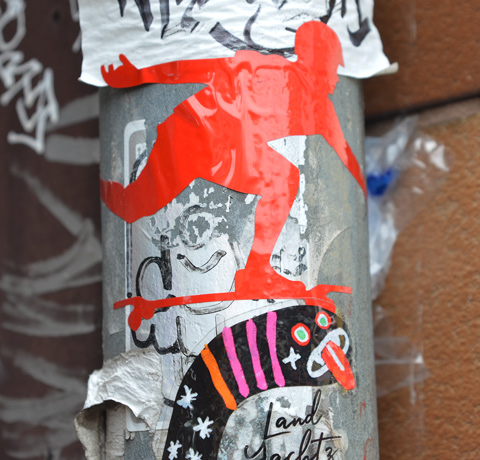 graffiti slap of a bright shiny red skateboarder on the move
