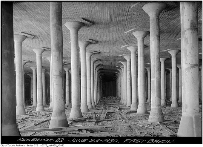 old black and white photo from City of Toronto archives of east basin of St. Clair Water Reservoir when its empty