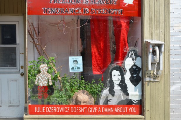 protest in window, Freedom is slavery, ignorance is 