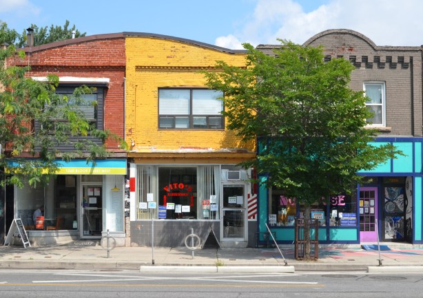 vitos barbershop and other two storey buildings on Bloor