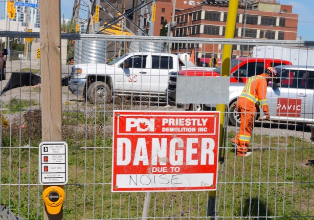 red and white danger due to sign, danger due to noise